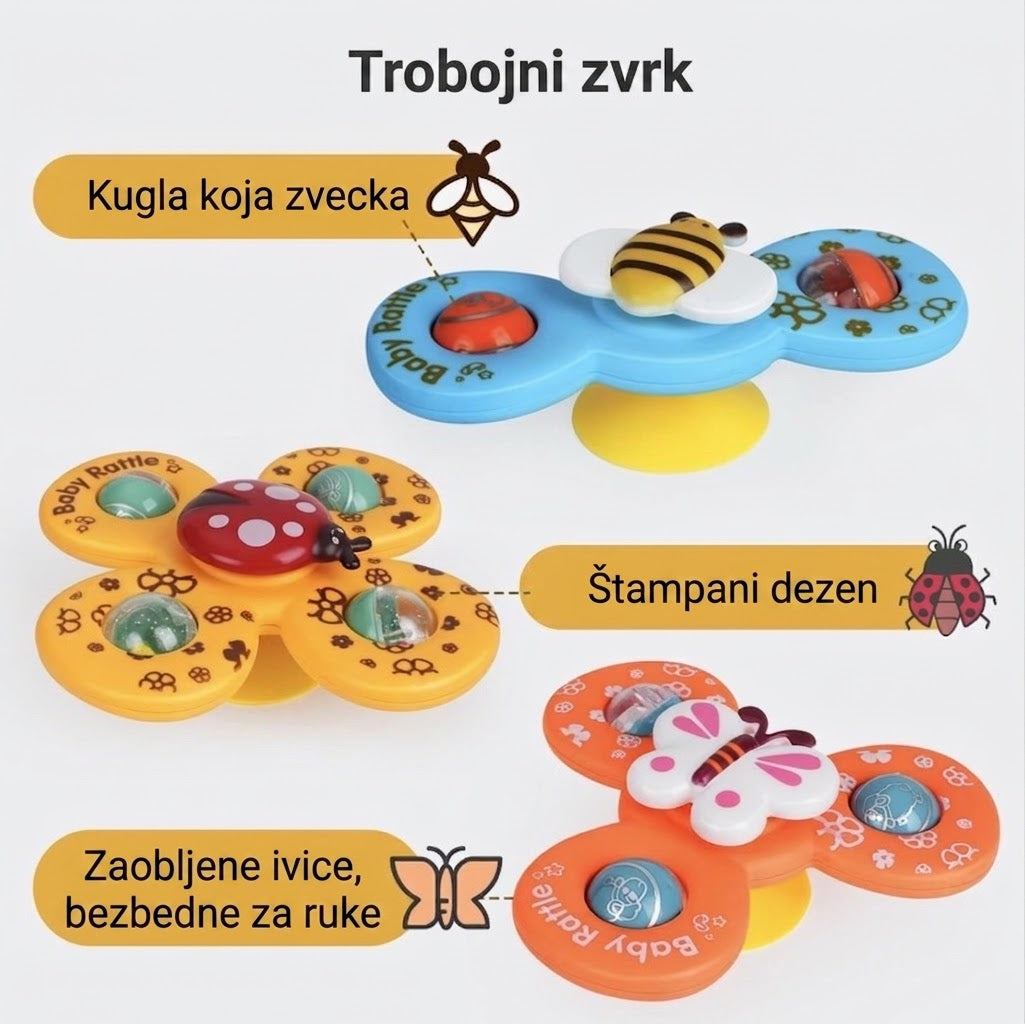 Mama i beba se igraju zvečkom zajedno